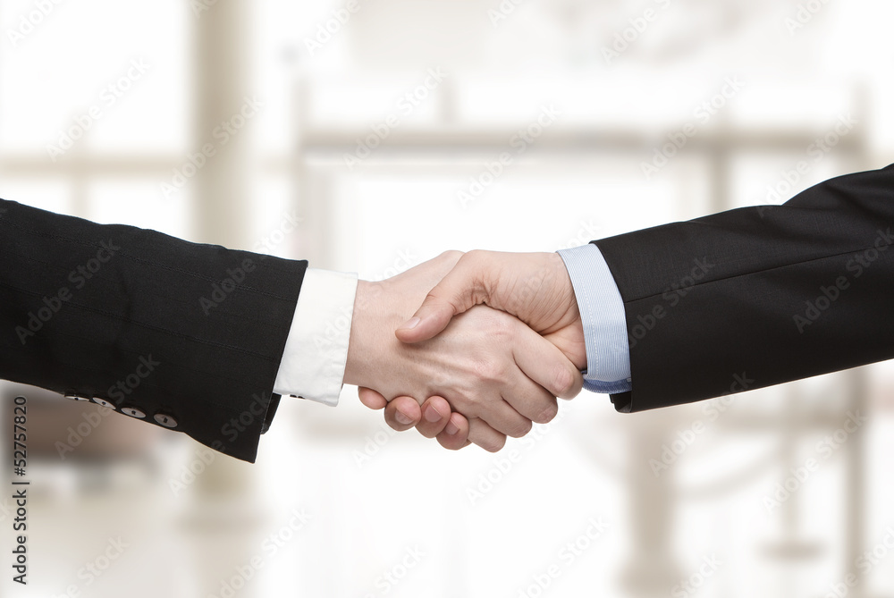 Close up of business handshake Close up of business handshake