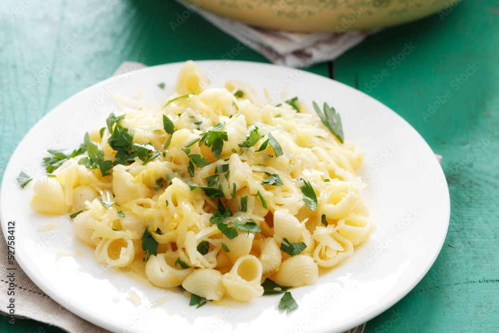 Pasta with cheese, lemon peel and pastry