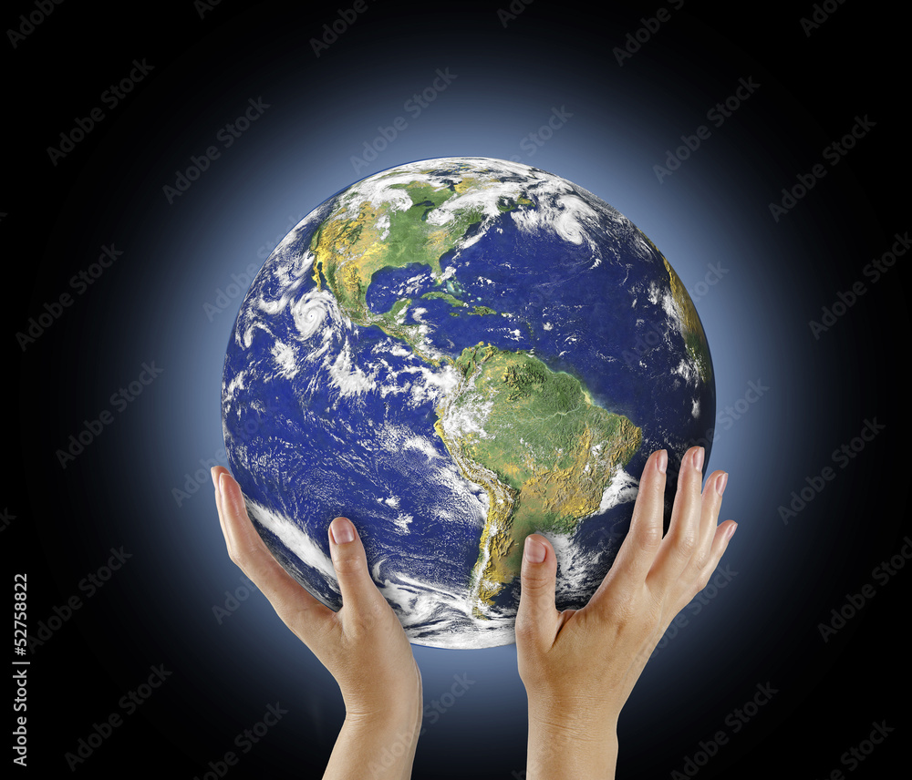Planet Earth in hand.Elements of this image furnished by NASA Planet Earth in hand.Elements of this image furnished by NASA