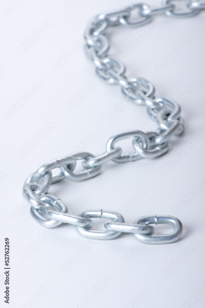 Fototapeta premium metal links of chain on a white background