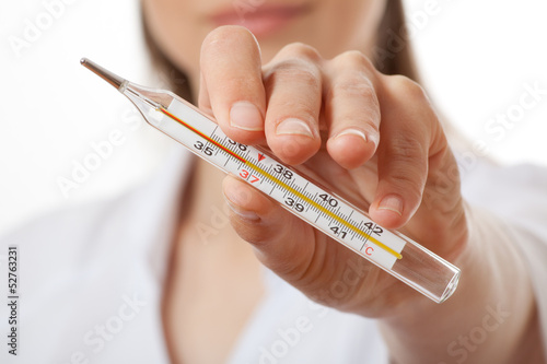 doctor nurse holding thermometer, isolated on white