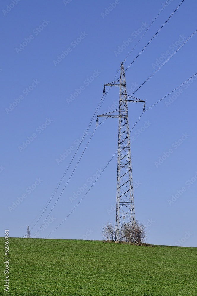 Electric transmission tower in the field