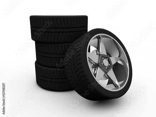 Car tire with rim on a white background