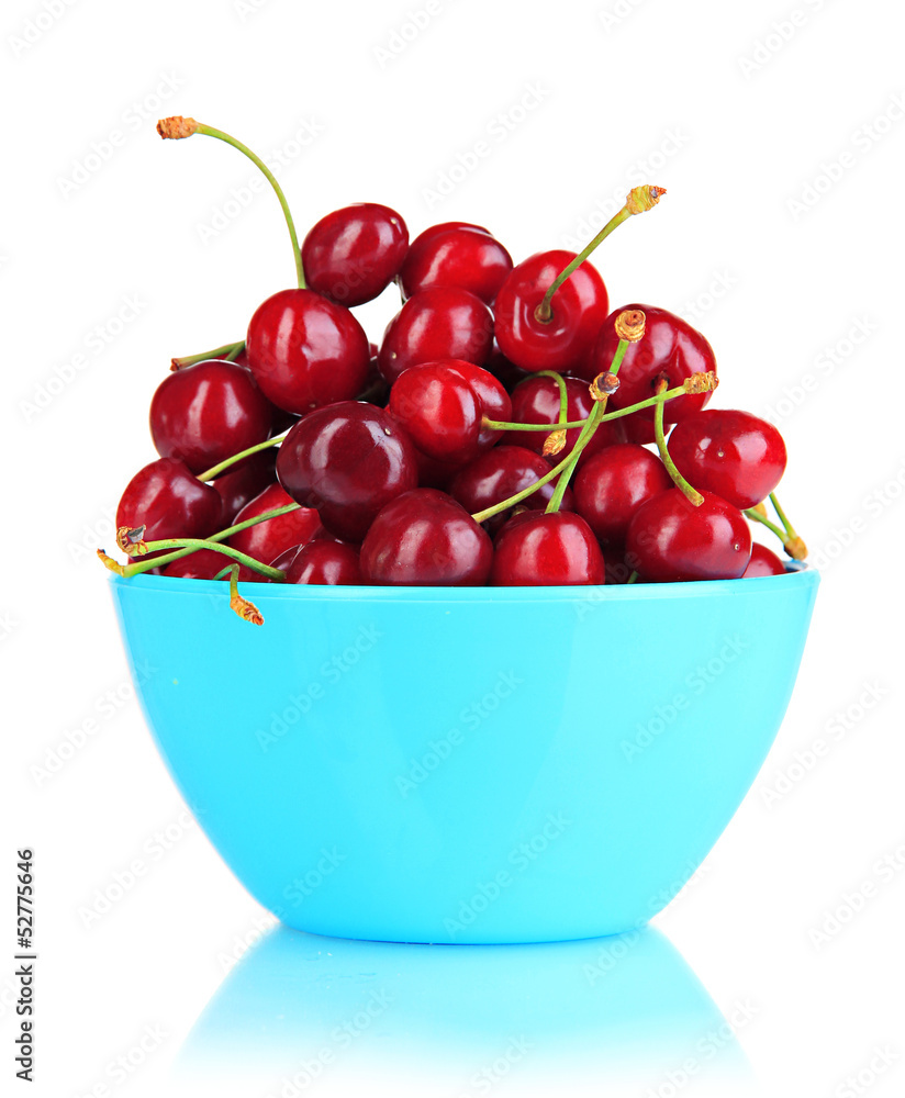 Ripe red cherry berries in bowl isolated on white Ripe red cherry berries in bowl isolated on white