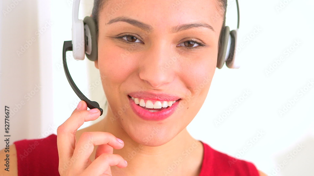 Hispanic woman with headset in customer support Hispanic woman with headset in customer support