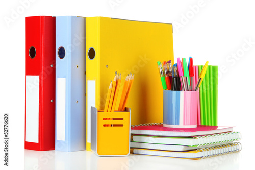 Bright office folders and different stationery isolated on photo