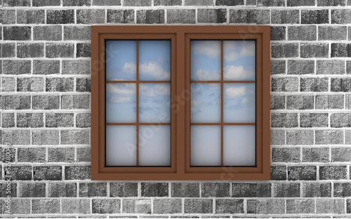 window on a brick wall  with the reflection of the sky
