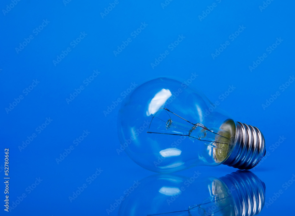 A light bulb, isolated on blue background