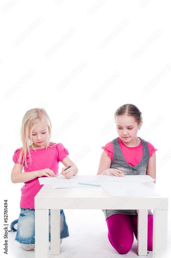 Small and beautiful children draw with pencils Small and beautiful children draw with pencils