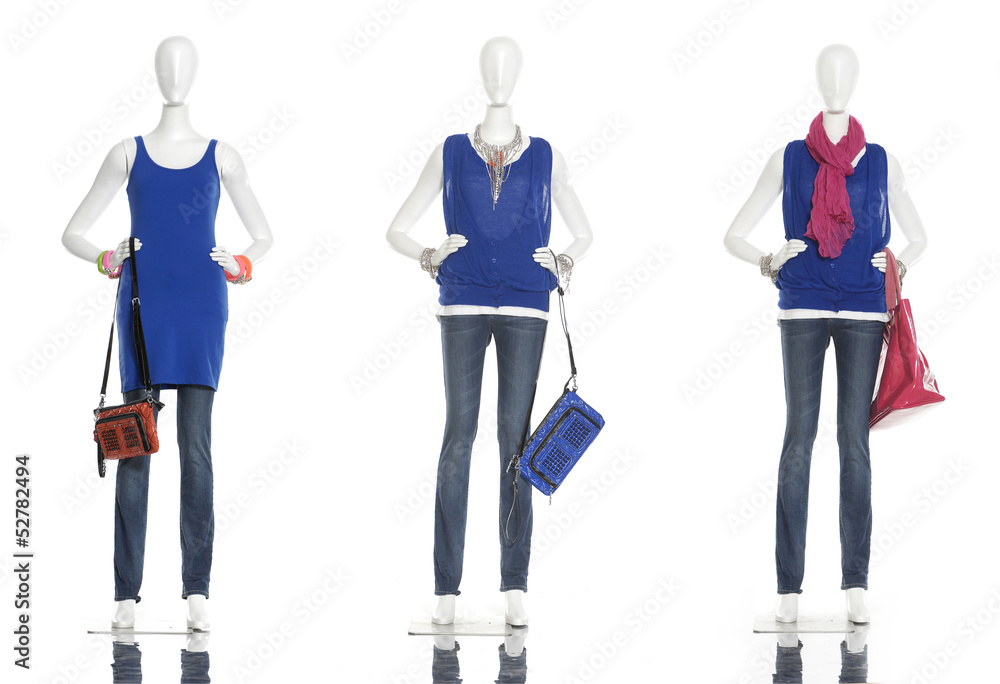female clothing in jeans with bag on three mannequin female clothing in jeans with bag on three mannequin