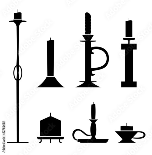 Set of stencil candlesticks with candles