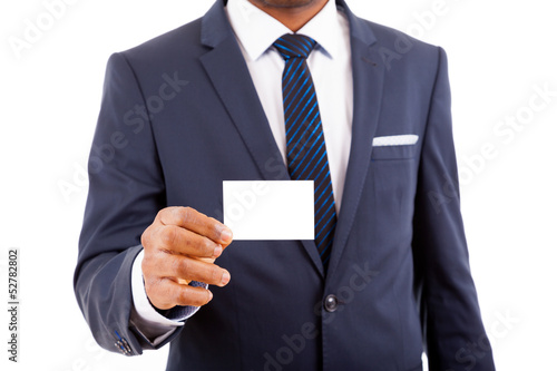 Business man in suit showing his business card, isolated on wite