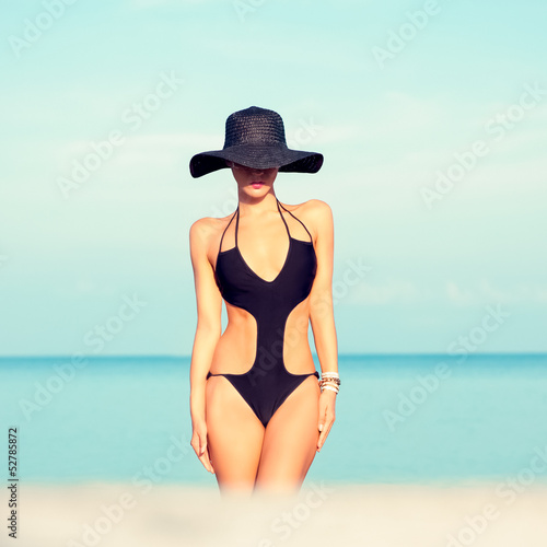 sensual fashion girl on the beach