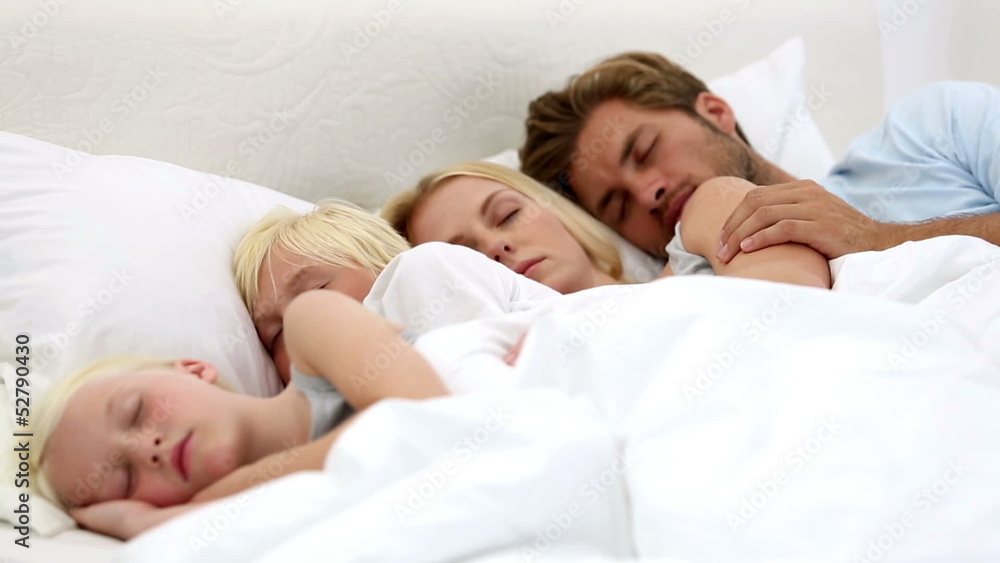 Parents and children sleeping together Parents and children sleeping together