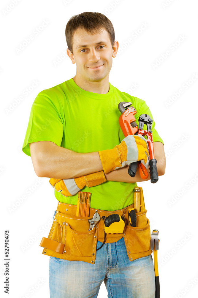 a worker holding tools a worker holding tools