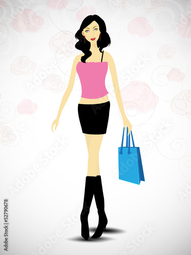Attractive fashionable girl with shopping bag .