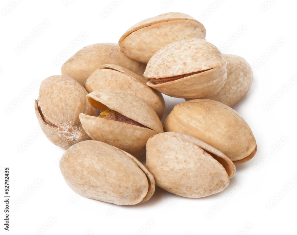 Handful of pistachios isolated on white background
