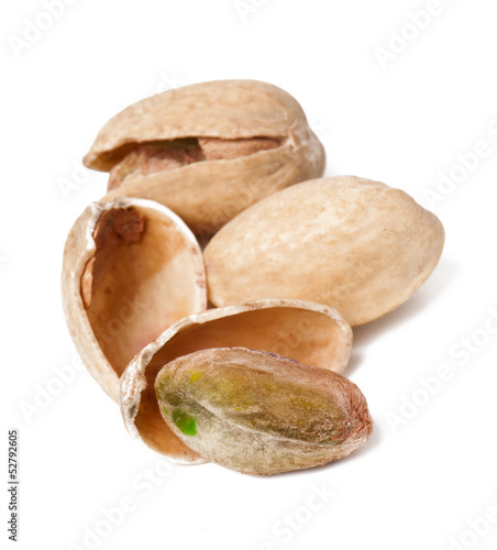 Handful of pistachios isolated on white background