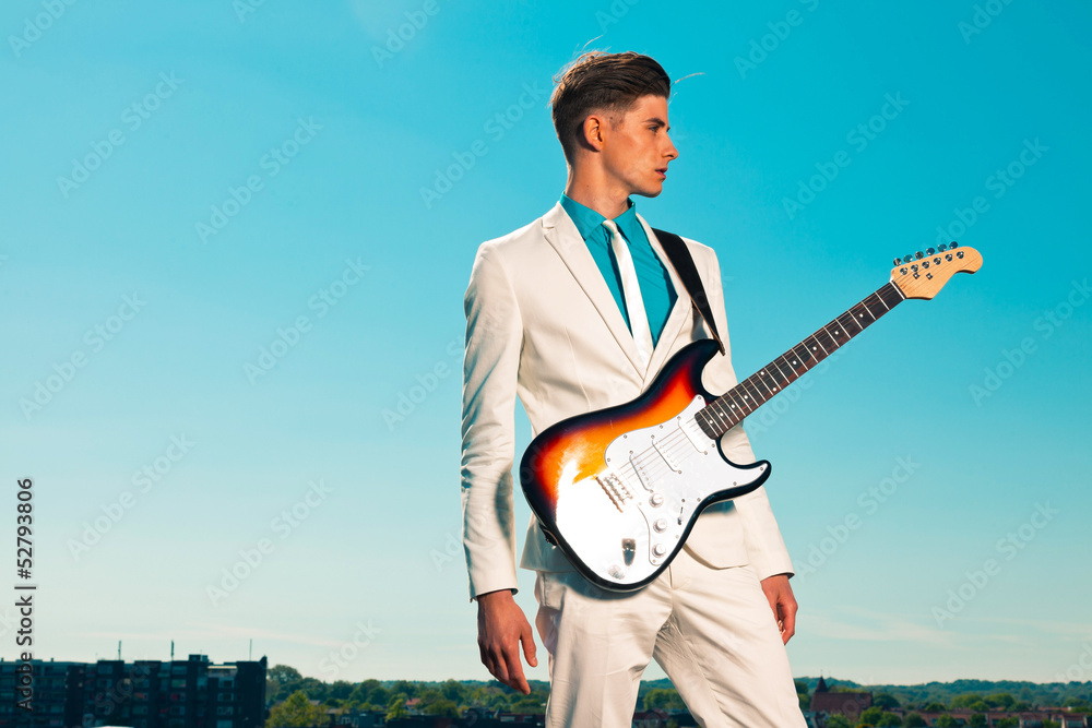 Vintage 50s male electric guitar player with white suit. On roof Stock  Photo | Adobe Stock