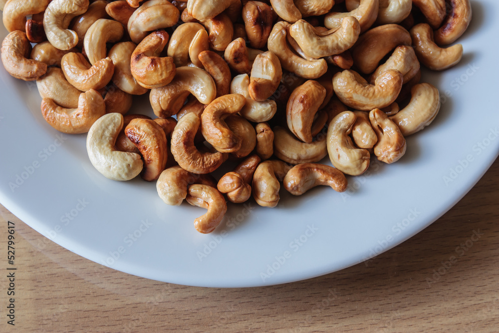 Naklejka premium Fry cashews.