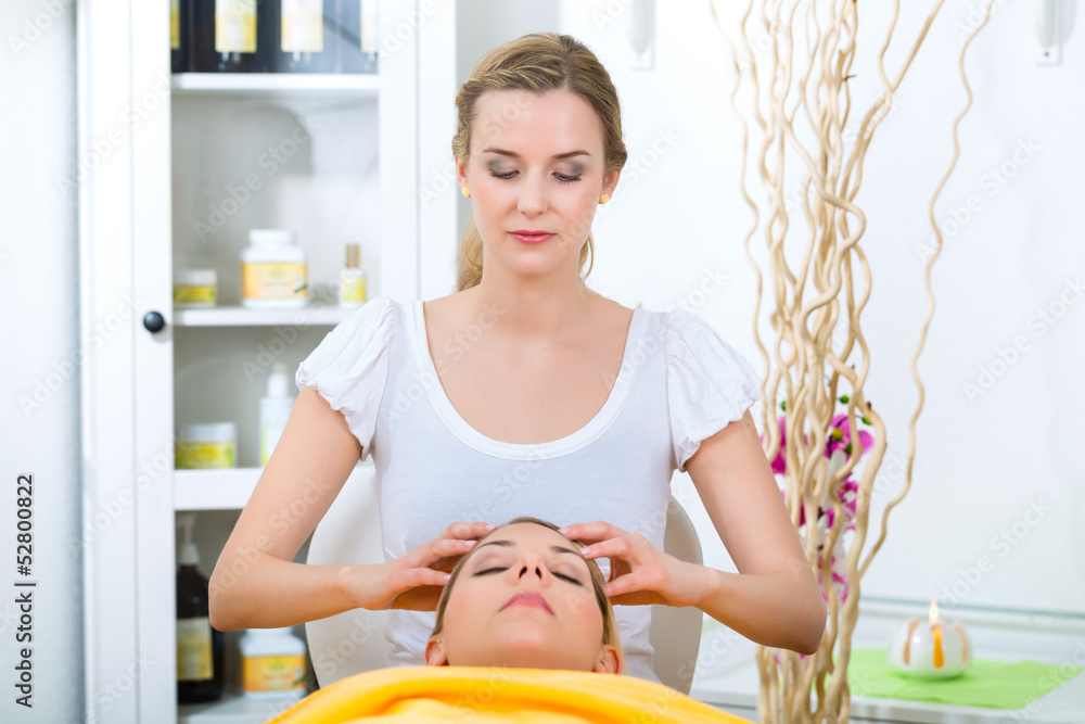 Wellness - woman getting head massage in Spa Wellness - woman getting head massage in Spa