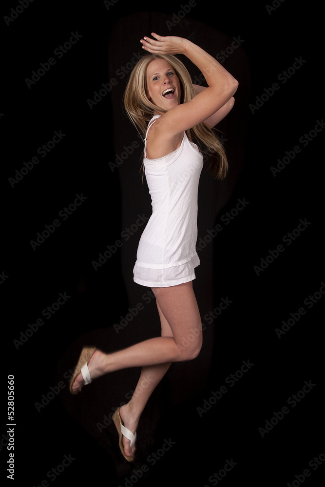 woman white dress jump on black