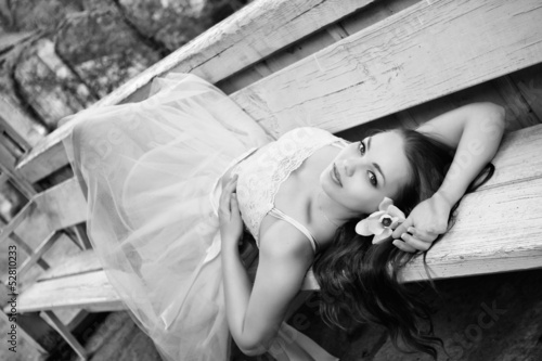 Beautiful brunette in a gazebo