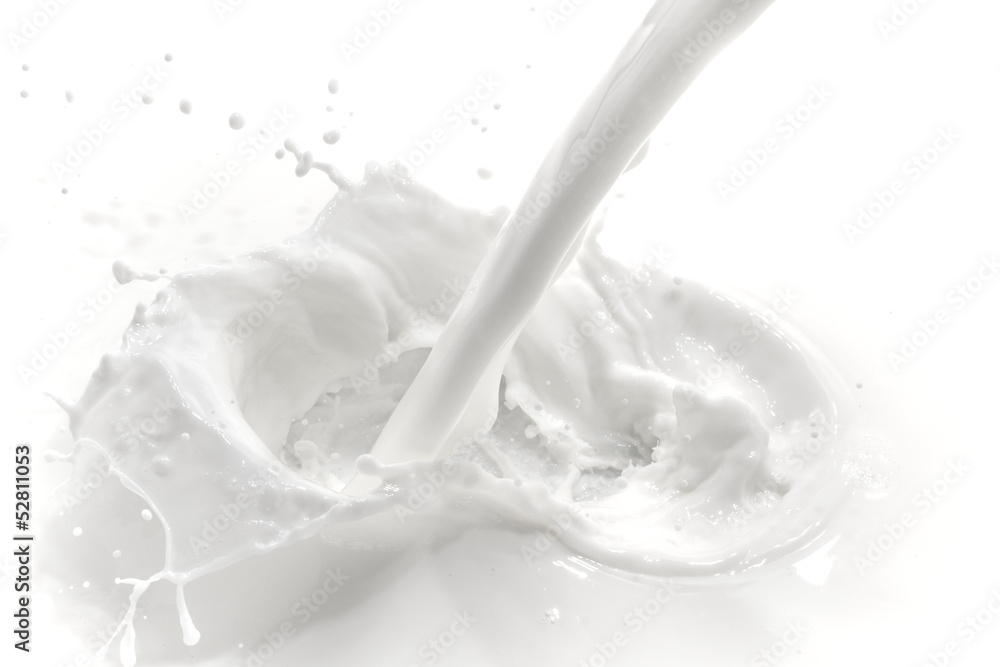 pouring milk splash - top view pouring milk splash - top view
