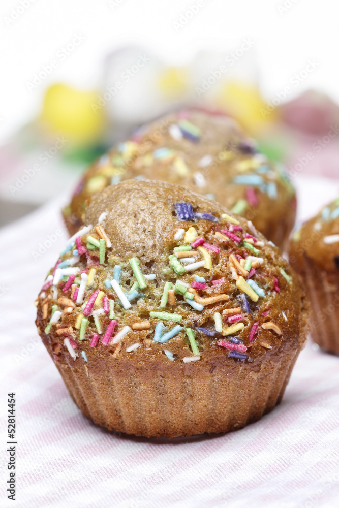 Delicious decorated muffins with selective focus Delicious decorated muffins with selective focus