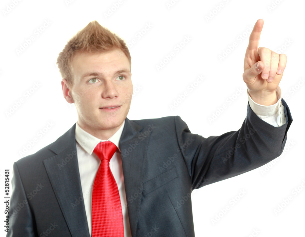 A young man pointing something isolated on white background A young man pointing something isolated on white background