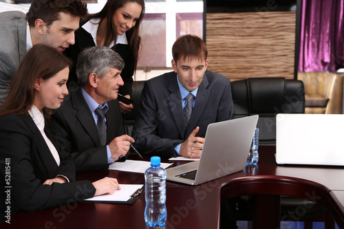 Business people working in ...