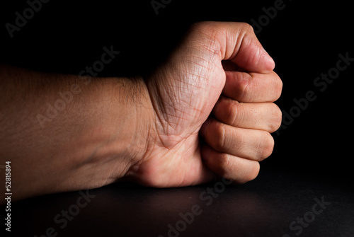 Fotografi Angry man banging fist on table