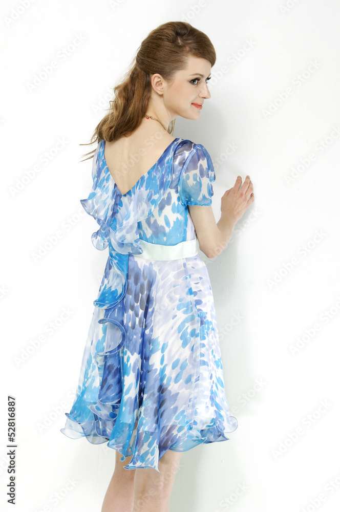 Portrait of cute female fashion model back posing Portrait of cute female fashion model back posing