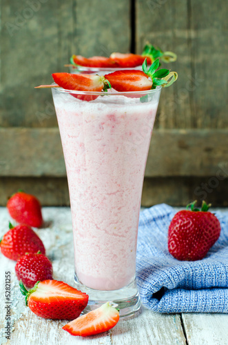 Milk cocktail with strawberries photo