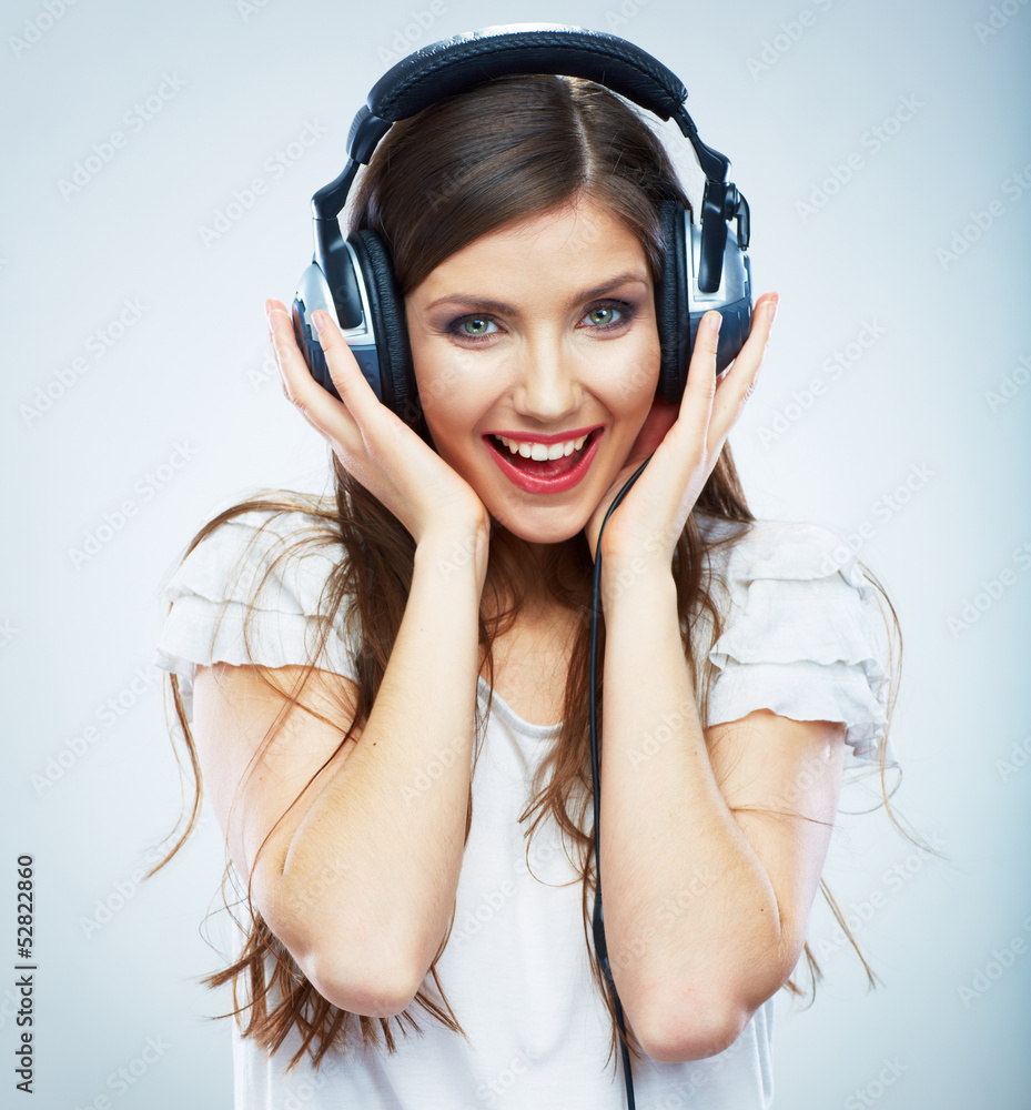 Young Happy Music woman isolated portrait. Female model studio Young Happy Music woman isolated portrait. Female model studio