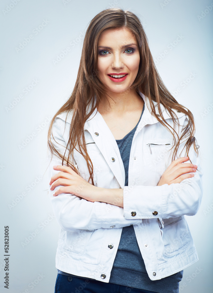 Casual style young woman posing on isolated studio background. Casual style young woman posing on isolated studio background.