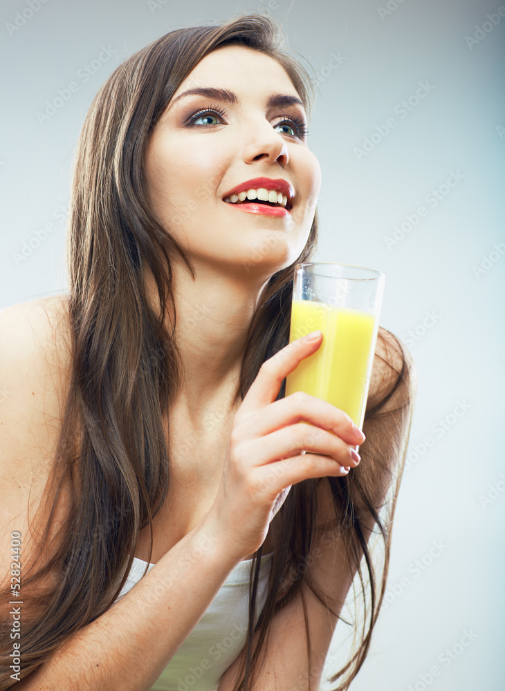 Young healthy woman hold juice glass . Young healthy woman hold juice glass .