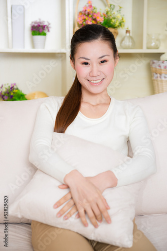 young asian woman at home