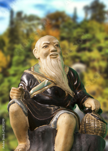 Chinese monk statue in mountains