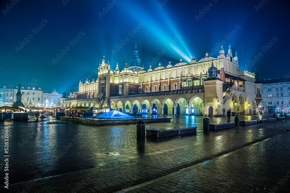 Naklejka premium Poland, Krakow. Market Square at night.