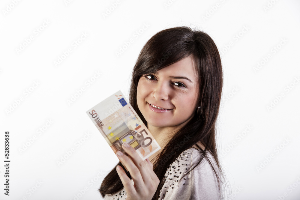 Geldschein in der Hand einer lächelnden Frau Geldschein in der Hand einer lächelnden Frau