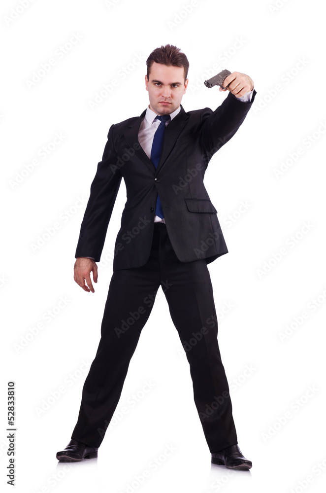 Businessman with gun isolated on white Businessman with gun isolated on white