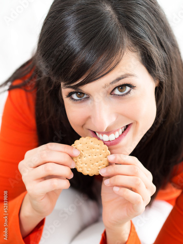 Woman eating cracker