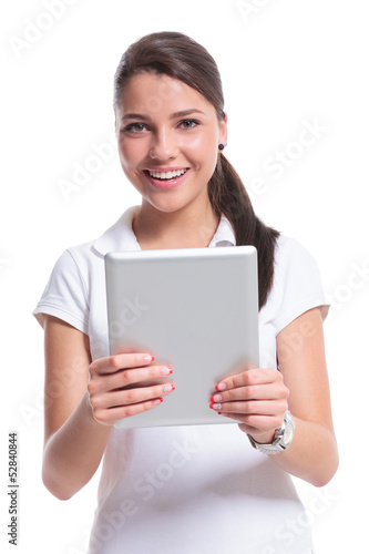 casual woman holds pad