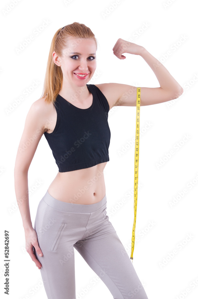 Young girl with centimeter in dieting concept Young girl with centimeter in dieting concept