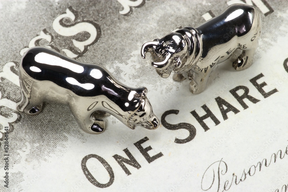 Börsensymbole Bulle und Bär auf englischer Aktie foto de Stock | Adobe