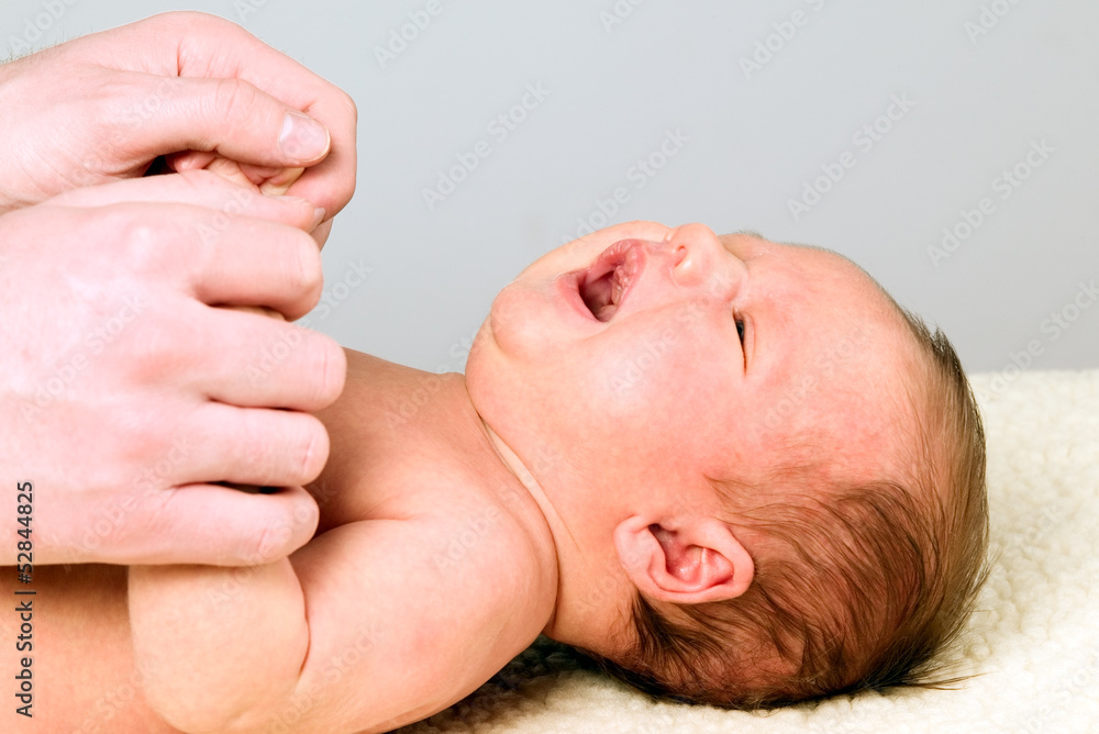 Father is holding little fingers of baby boy Father is holding little fingers of baby boy