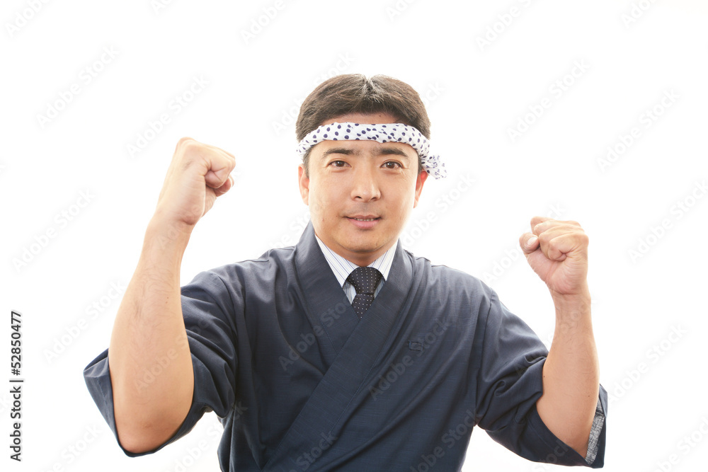 ガッツポーズの寿司職人