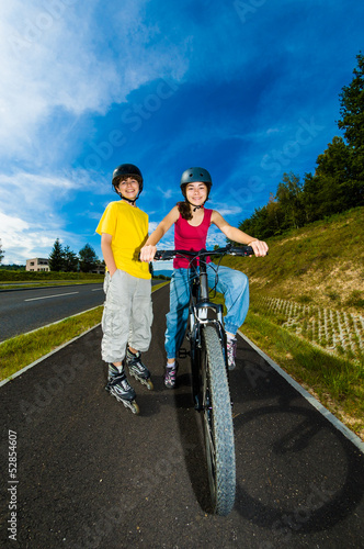 Active young people - rollerblading, cycling