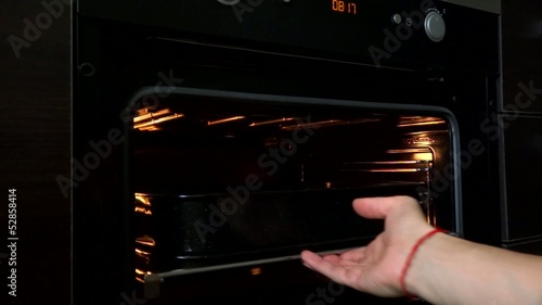 person open oven cooking